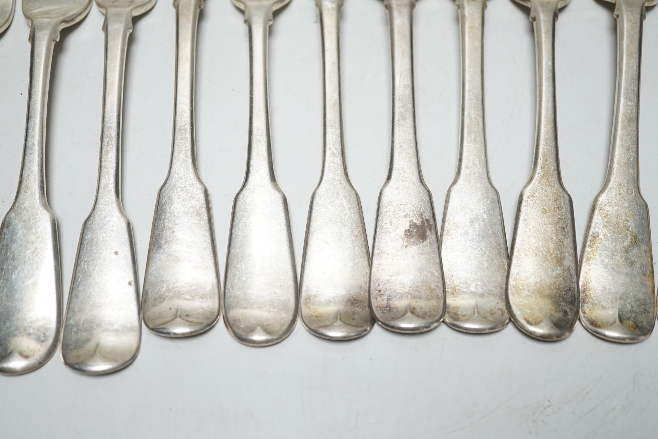 A set of twelve George III silver fiddle pattern table forks, William Eaton? London, 1812,14/15, 29.8oz.